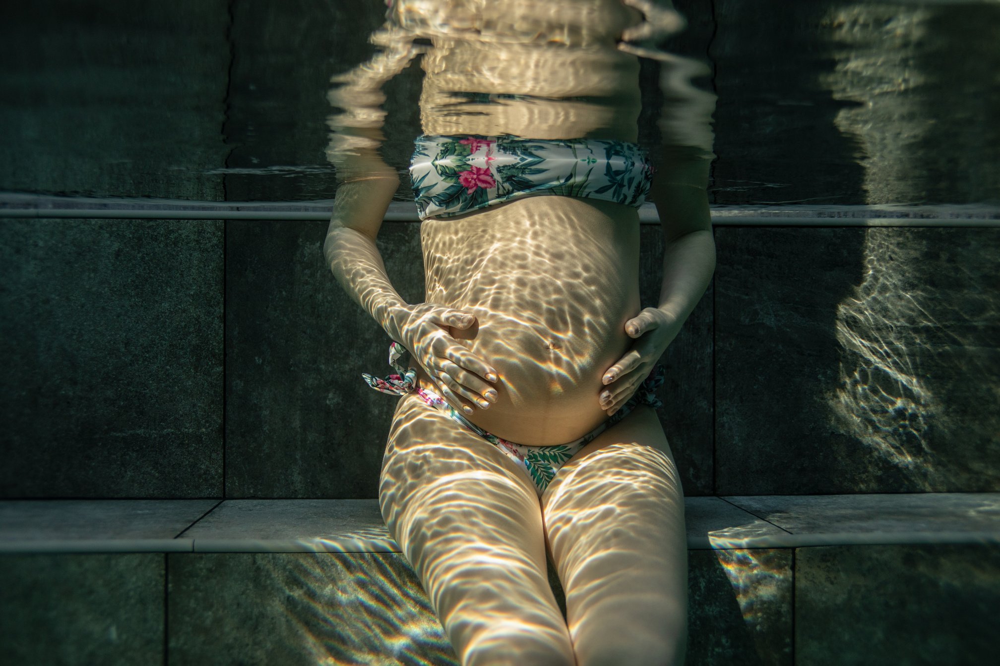 Pregnant woman in swimming pool